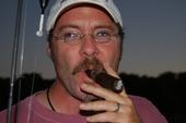 Hank Shaw smoking a cigar