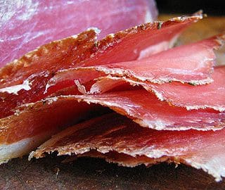 A close up of lonzino slices