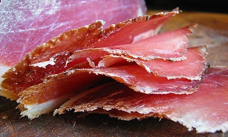 A close up of lonzino slices