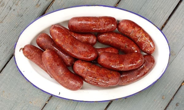 smoked wild boar sausages in a bowl