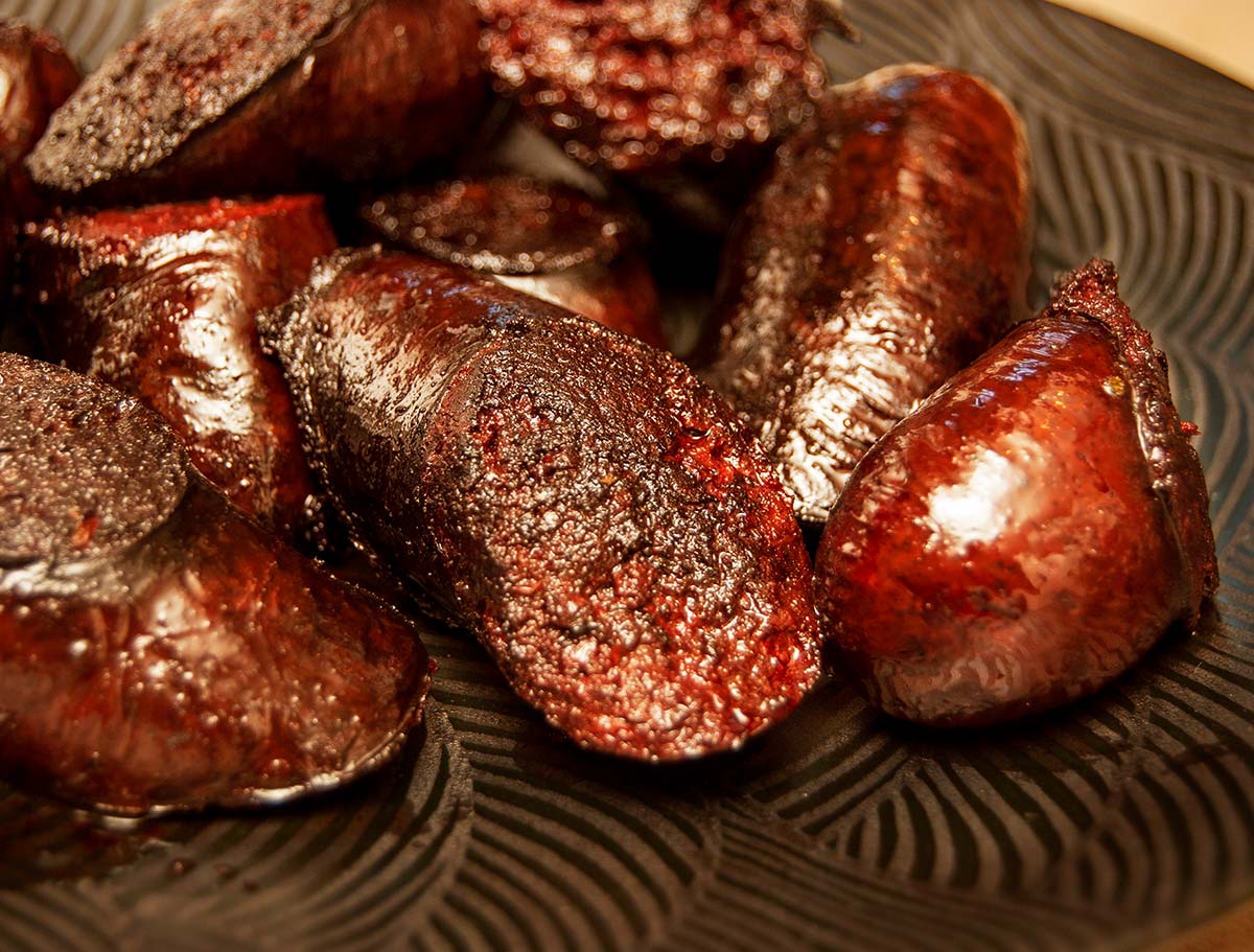 Close up showing texture of the finished blood sausage. 