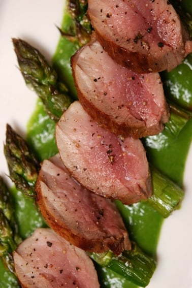 Pork loin with asparagus on a plate