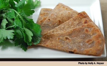 Wedges of acorn flatbread on a plate