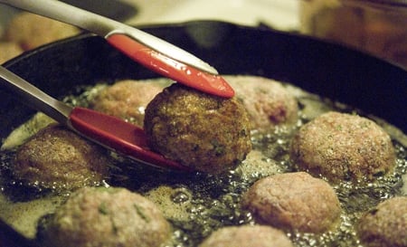 Frying the Italian meatballs