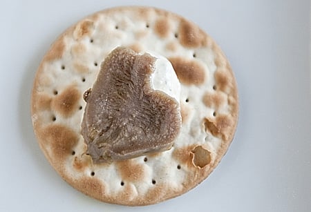 braised venison tongue with horseradish on a cracker
