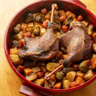 Slow roasted Canada goose legs over roasted vegetables.