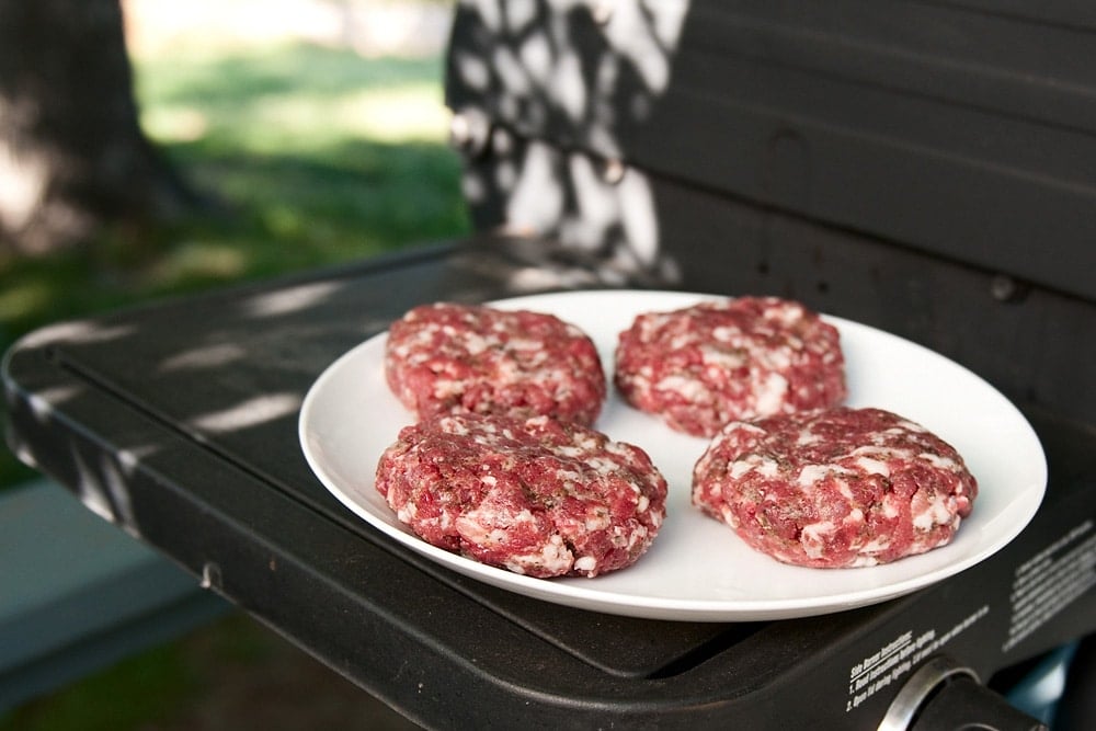 Mushroom Swiss burgers waiting to be grilled