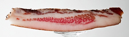 sliced guanciale side view