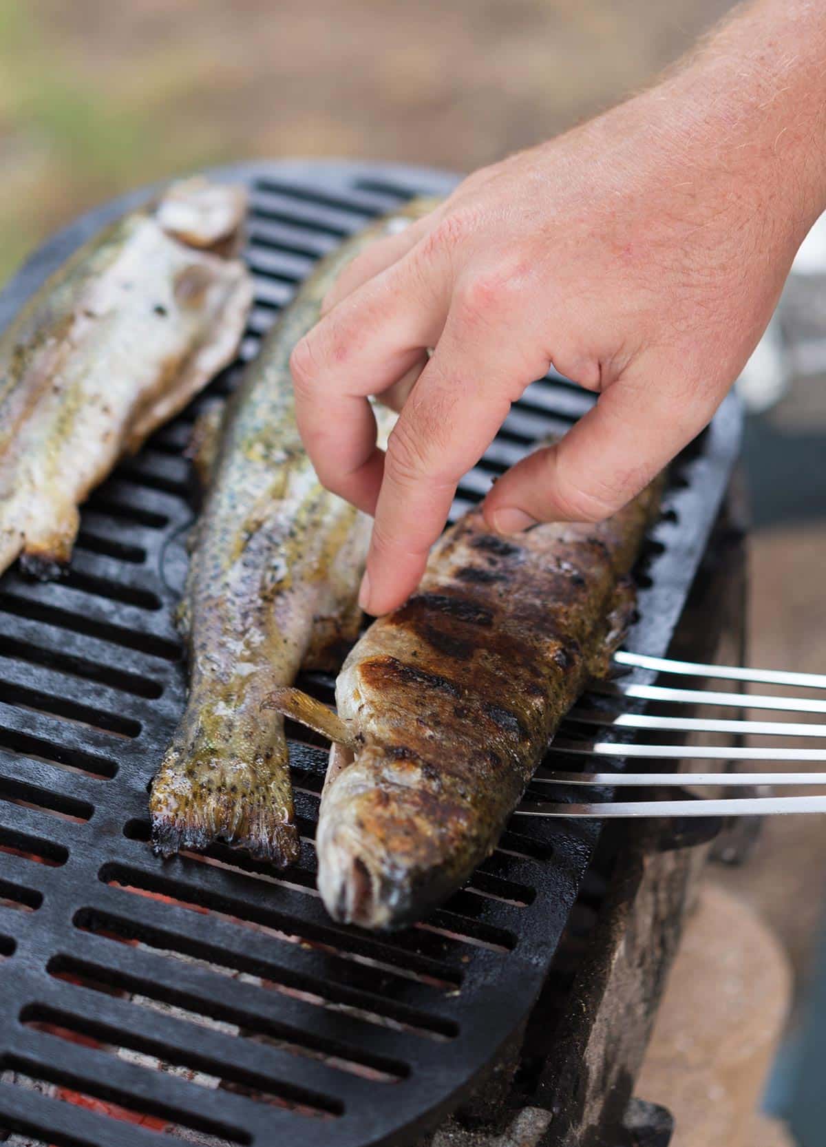 Flipping a grilled whole fish