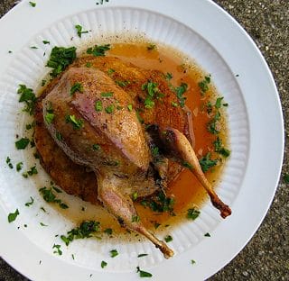 Roast woodcock Michigan, on a plate.