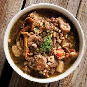 goose stew with barley in a bowl