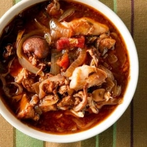 A bowl of rabbit stifado, called kouneli stifado in Greek.