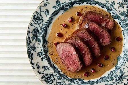 Venison medallions with gin and juniper on a plate
