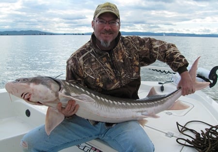 Hank Shaw with a sturgeon. 