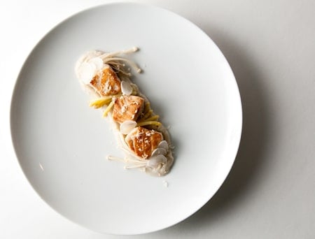 Overhead view of sturgeon with enoki mushrooms