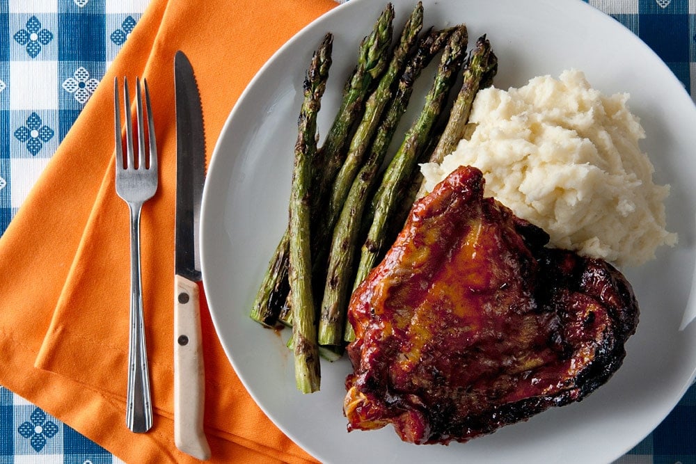 barbecued turkey thighs with asparagus and mashed potatoes