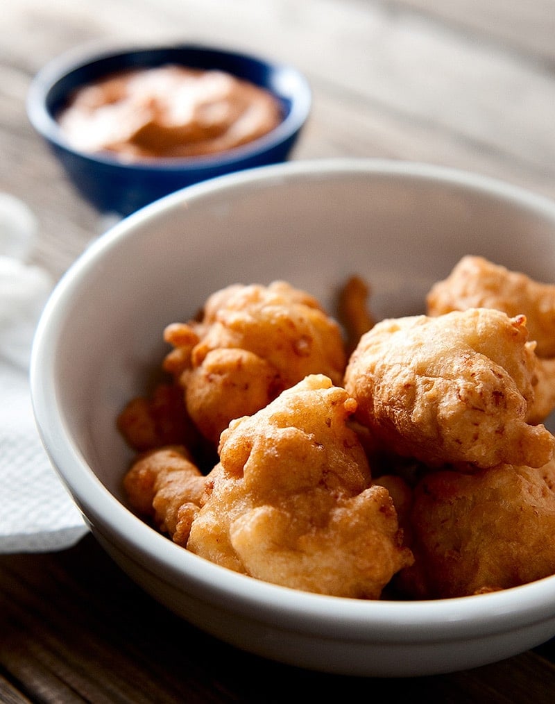 New England clam cakes in a bowl. 