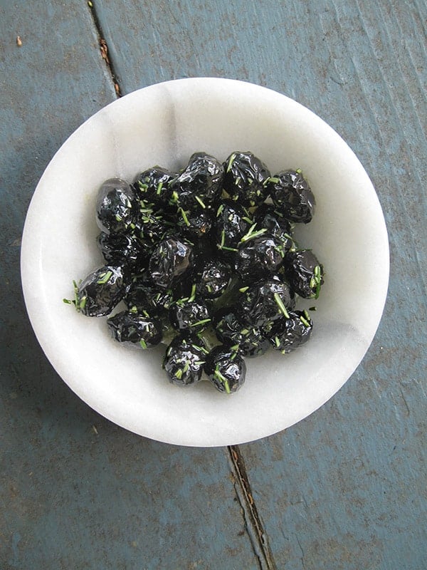 Finished oil cured olives in bowl