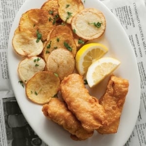 A plate of beer battered fish and chips