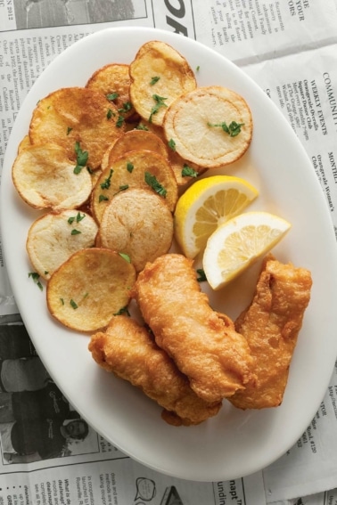A plate of beer battered fish and chips
