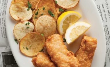 A plate of beer battered fish and chips