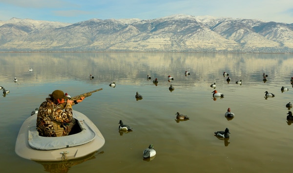 Hunting ducks in a layout blind in Salt Lake. 
