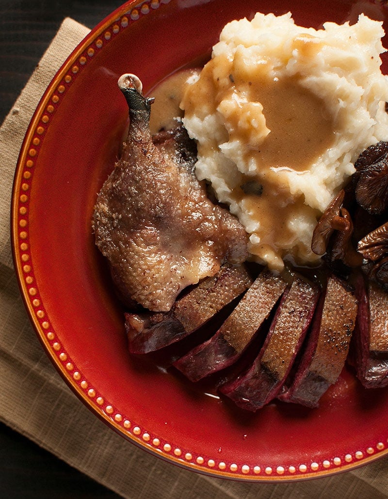 Maple bourbon sauce over mashed potatoes and duck.