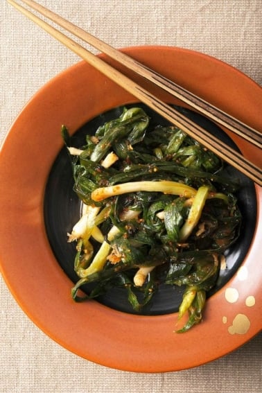 Green onion kimchi on a plate