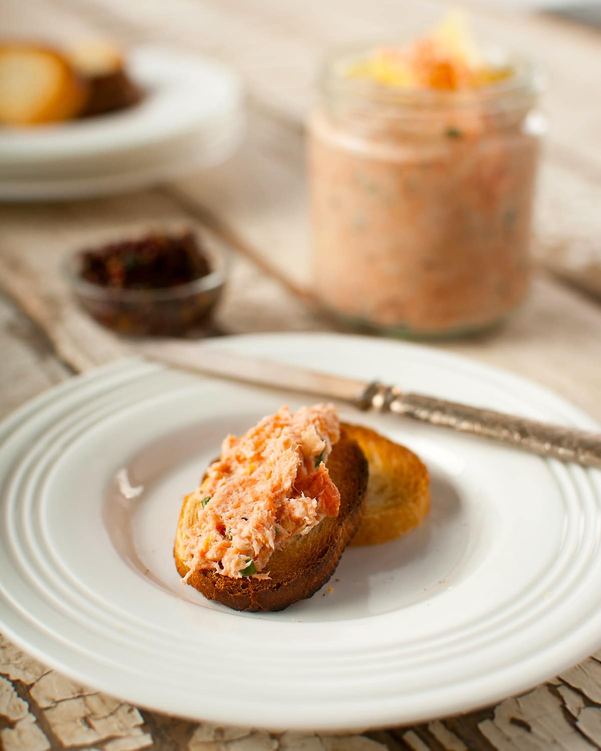 salmon rillettes on toast on a plate