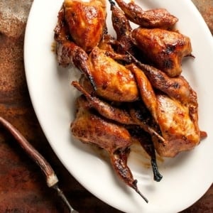 A platter of BBQ quail.