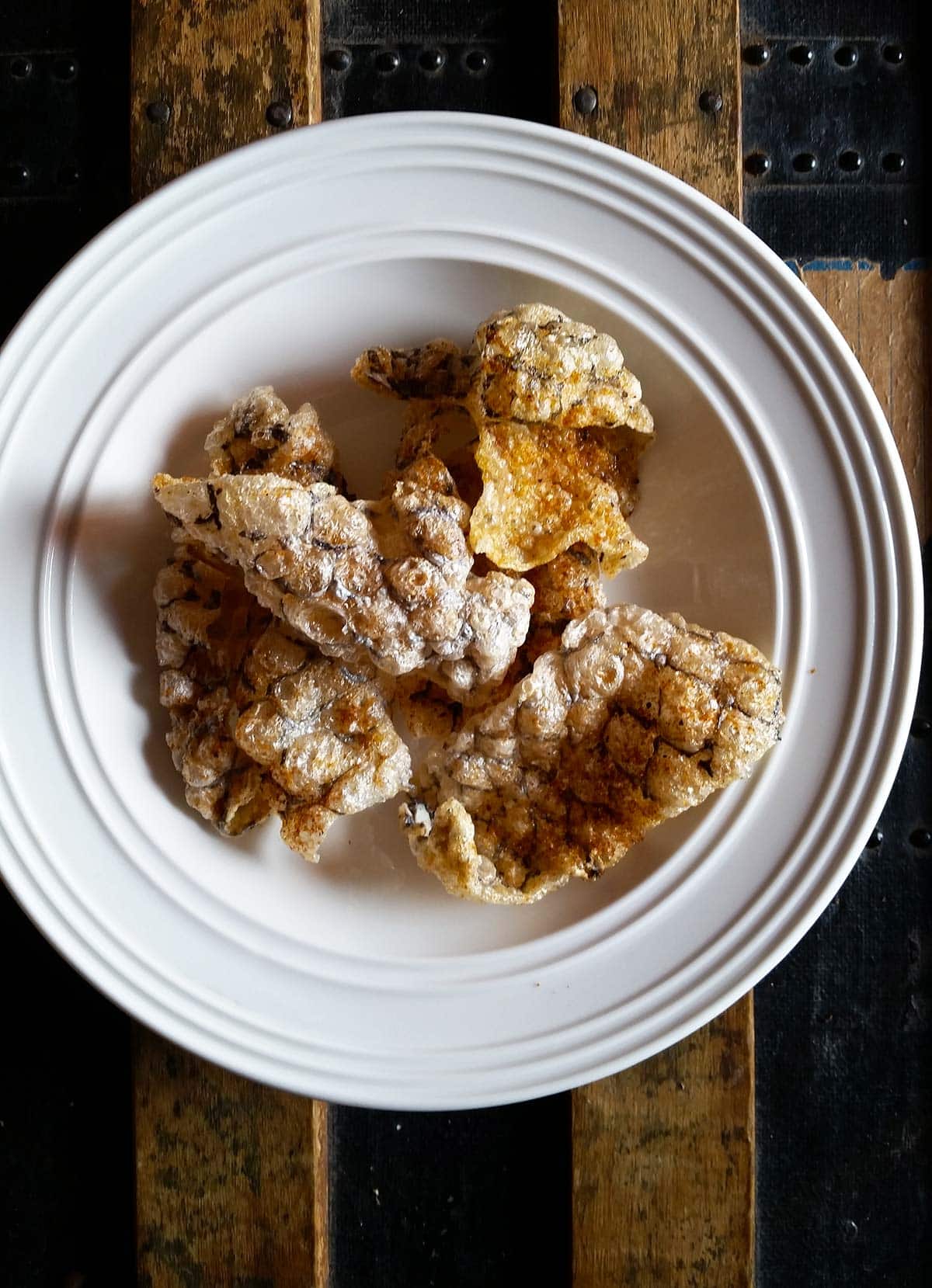 Tripletail fish skin chips in a bowl