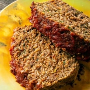 Close up of two slices of venison meatloaf.