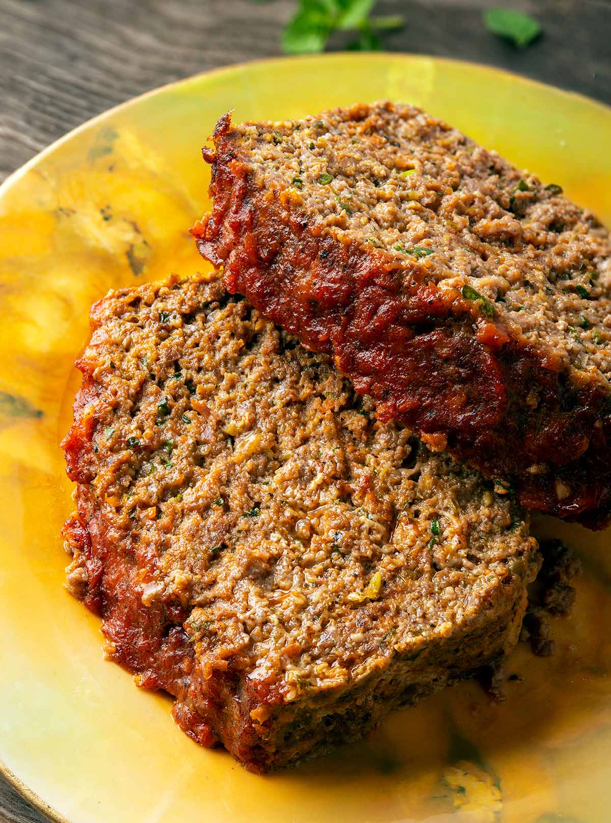 Close up of two slices of venison meatloaf.