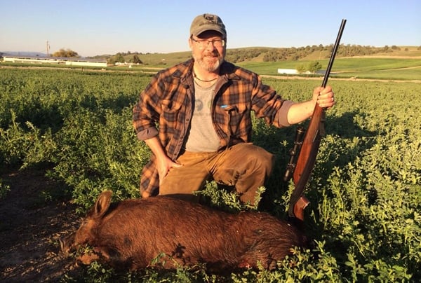 Hank Shaw with a wild boar. 