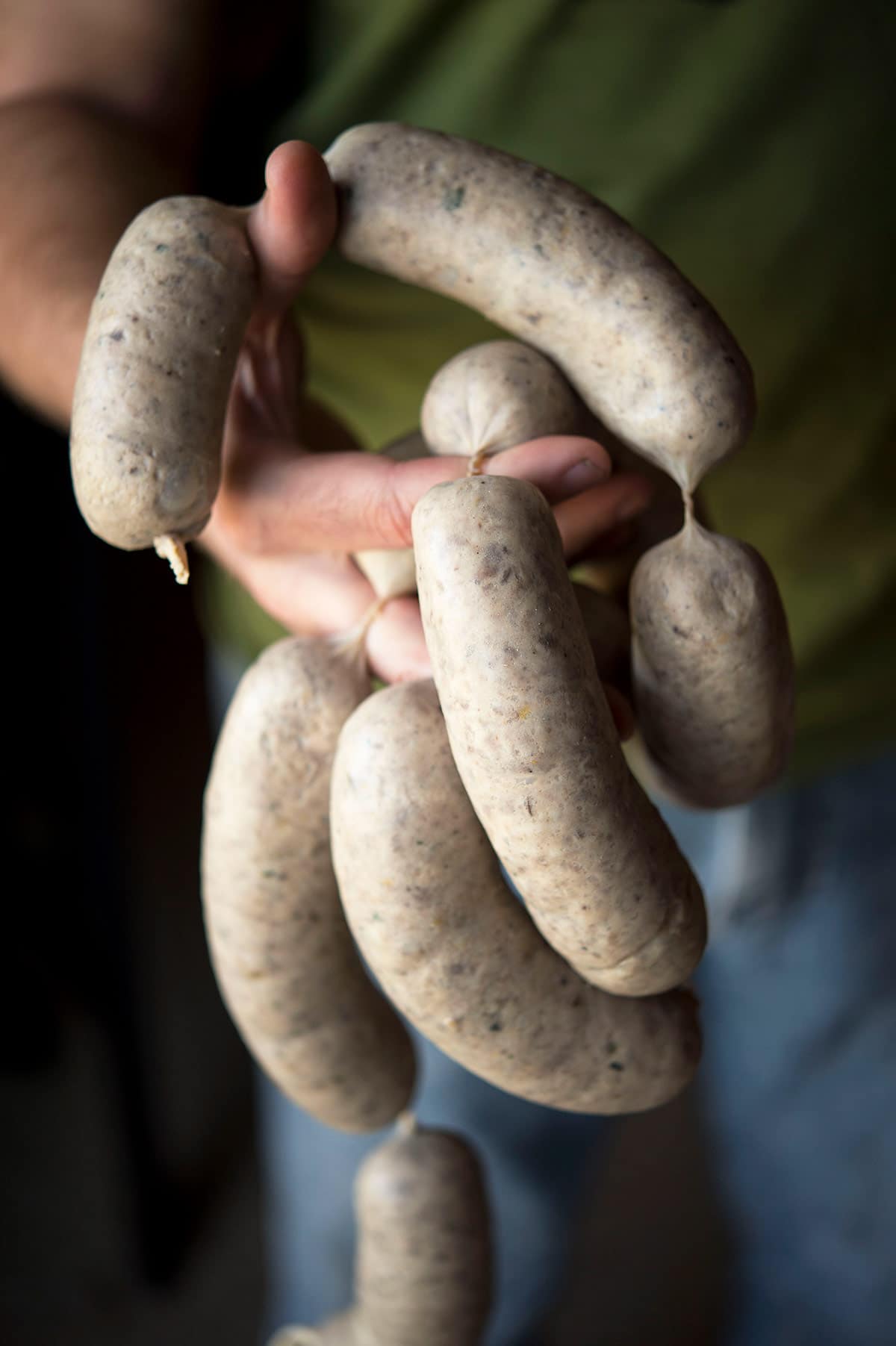 Hank Shaw holding Sheboygan brats