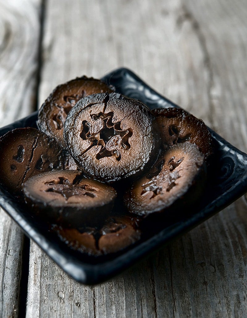 closeup of finished pickled walnuts 