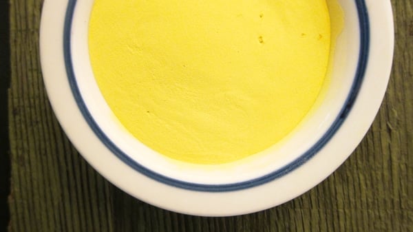 A close up of a bowl of pine pollen