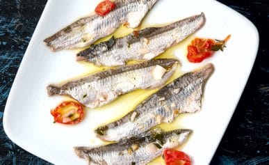 A plate of boquerones ready to eat.