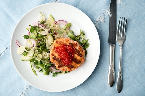 Fresh salmon patties grilled with a summer salad