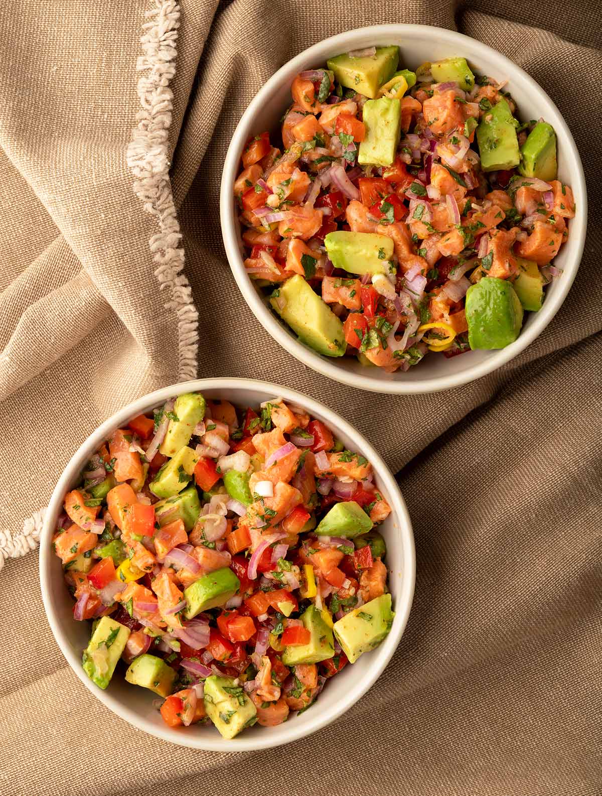 Two bowls of salmon ceviche