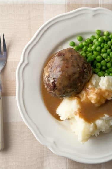 British meatballs with mashed potatoes and peas