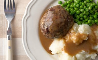 British meatballs with mashed potatoes and peas
