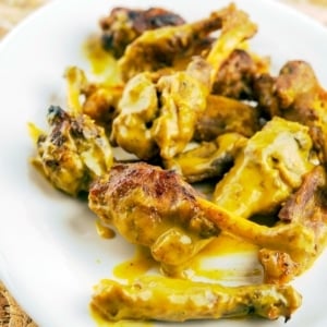 Close up of a platter of honey mustard duck wings.