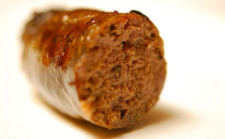 closeup of duck sausages, hunter's style, showing the grind