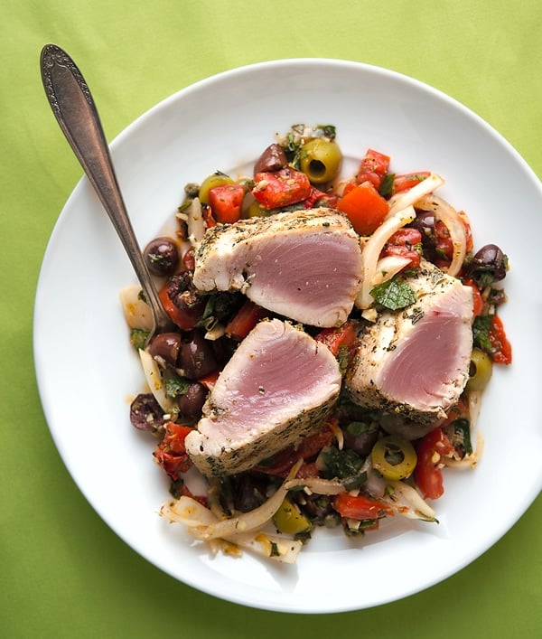 Grilled tuna with Sicilian salad on a plate