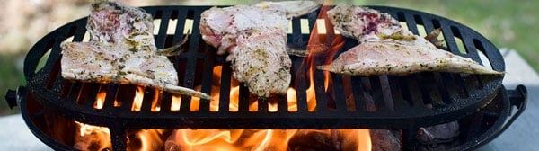 fish collars in a roaring grill