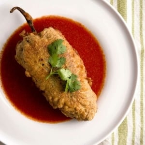 Chile poblano rellenos with tomato sauce