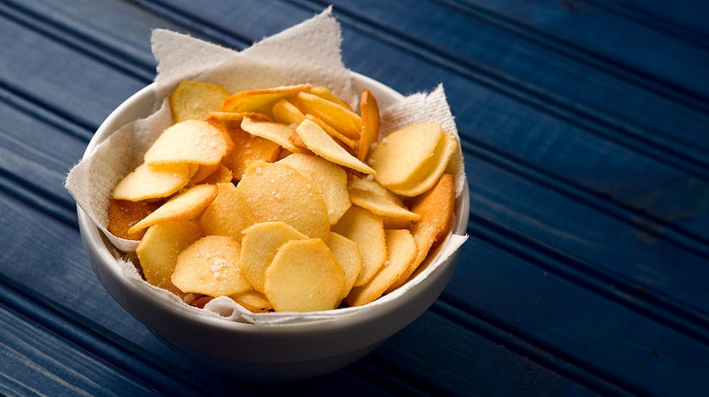 Fried arrowhead chips in a bowl. 