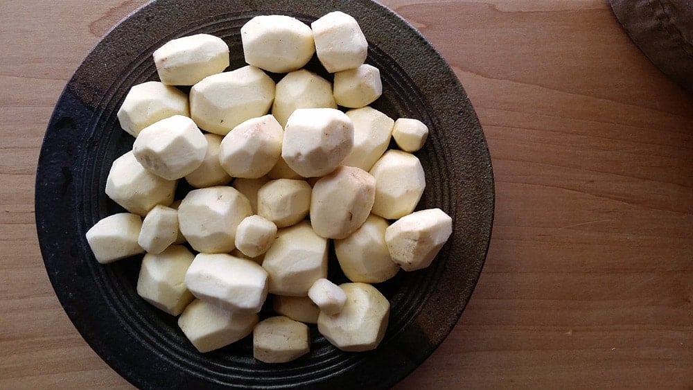 Peeled wapato in a bowl