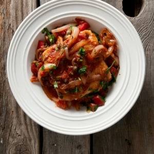 Italian glutton's style fish in a bowl